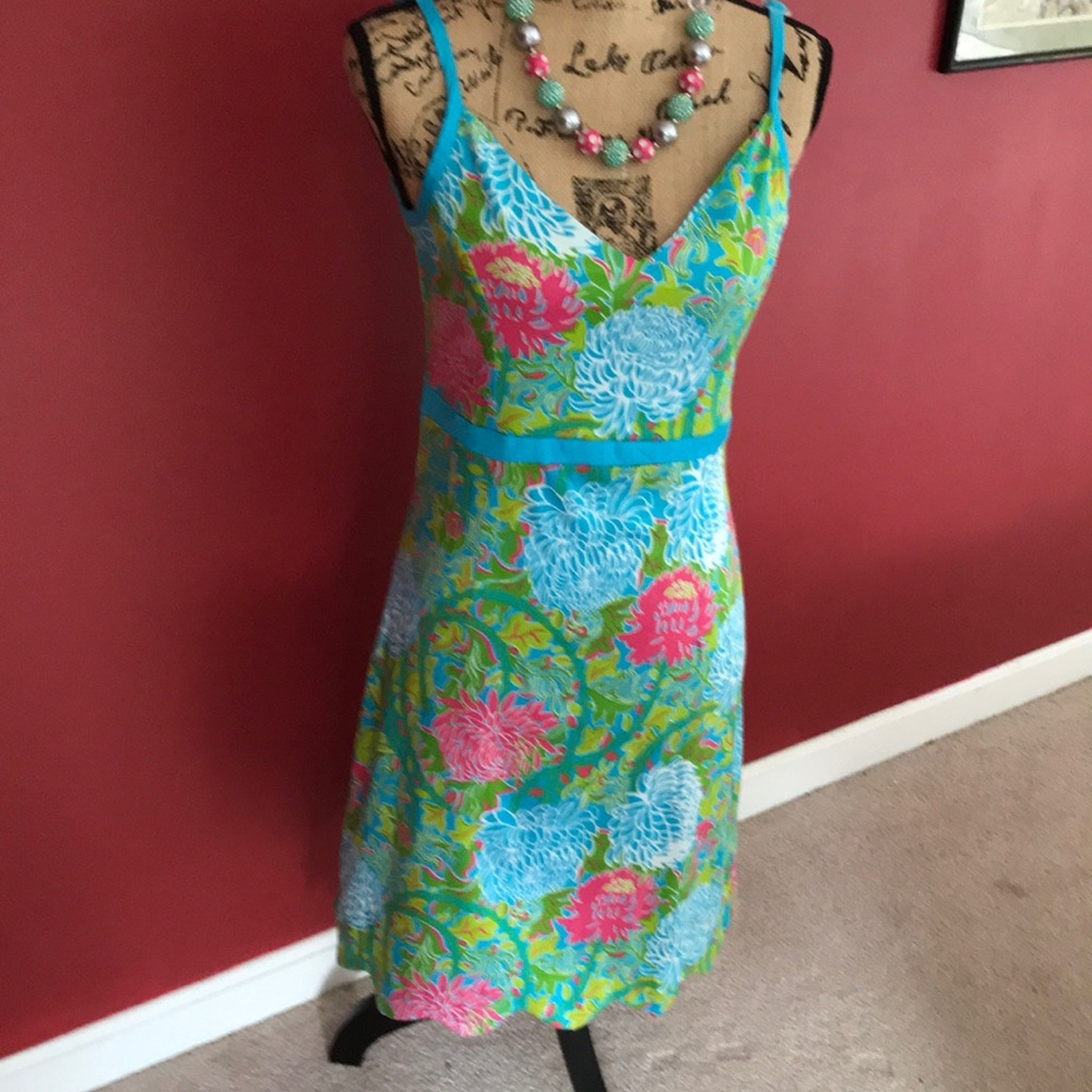 Key West v neck bright and beautiful sleeveless dress with scalloped hemline.